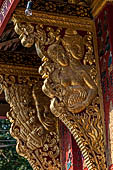 Wat Xieng Thong temple in Luang Prabang, Laos. the Ho Tai, the library. Detail of the console of the roof. 